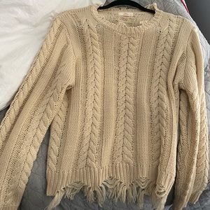 Distressed fray sweater